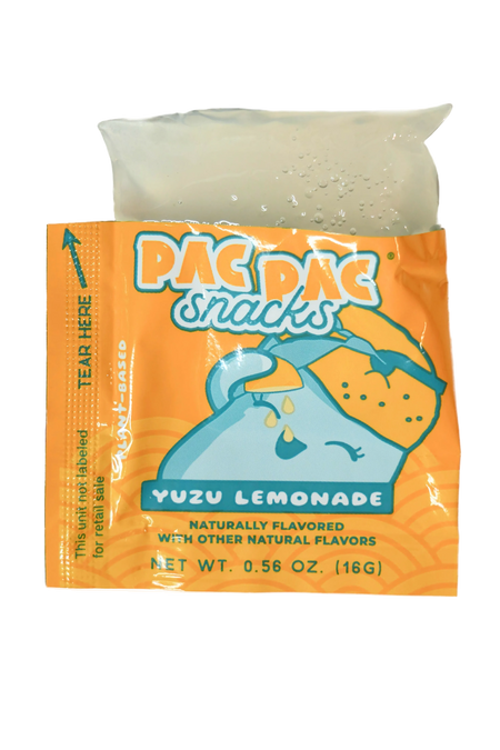 Pac Pac yuzu lemonade konjac jelly open sachet with konjac jelly coming out of top